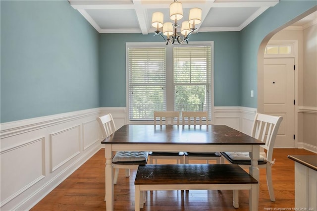 1234 Micahs Way N, Spring Lake, NC 28390 - dining space with plenty of natural light, coffered ceiling, wood finished floors, a chandelier, and beam ceiling