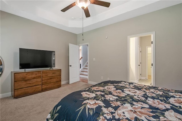 1234 Micahs Way N, Spring Lake, NC 28390 - bedroom with carpet, a ceiling fan, and a raised ceiling
