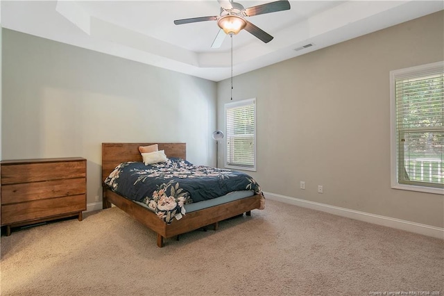 1234 Micahs Way N, Spring Lake, NC 28390 - bedroom featuring carpet floors, a raised ceiling, and a ceiling fan