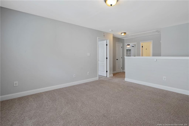 1234 Micahs Way N, Spring Lake, NC 28390 - unfurnished room featuring attic access and light colored carpet