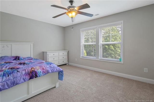 1234 Micahs Way N, Spring Lake, NC 28390 - carpeted bedroom featuring baseboards and ceiling fan