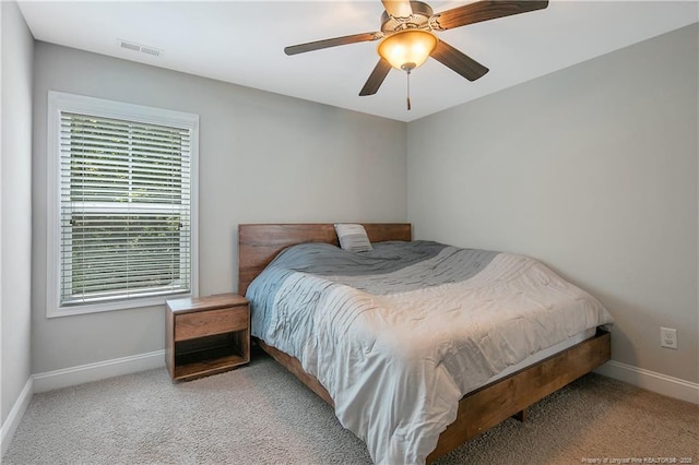 1234 Micahs Way N, Spring Lake, NC 28390 - carpeted bedroom featuring baseboards and a ceiling fan