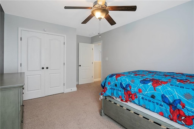 1234 Micahs Way N, Spring Lake, NC 28390 - bedroom with light carpet, ceiling fan, and a closet