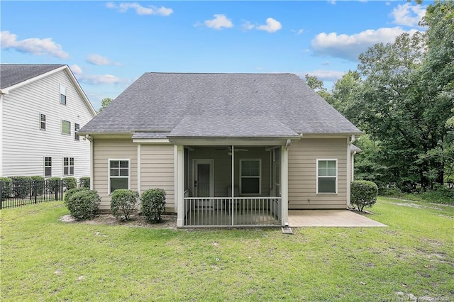 1234 Micahs Way N, Spring Lake, NC 28390 - back of property with a patio, a sunroom, and roof with shingles