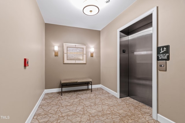 116 Northbrook Dr Unit 303, Raleigh, NC 27609 - hall featuring elevator and baseboards
