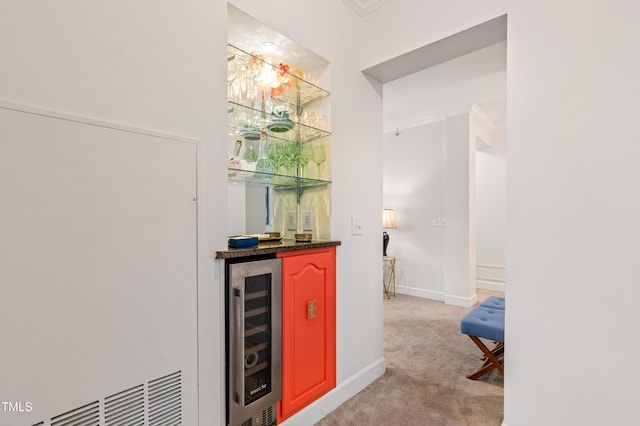 116 Northbrook Dr Unit 303, Raleigh, NC 27609 - indoor dry bar featuring wine cooler, light carpet, and crown molding