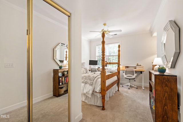 116 Northbrook Dr Unit 303, Raleigh, NC 27609 - bedroom featuring ornamental molding, light colored carpet, an office area, and a ceiling fan
