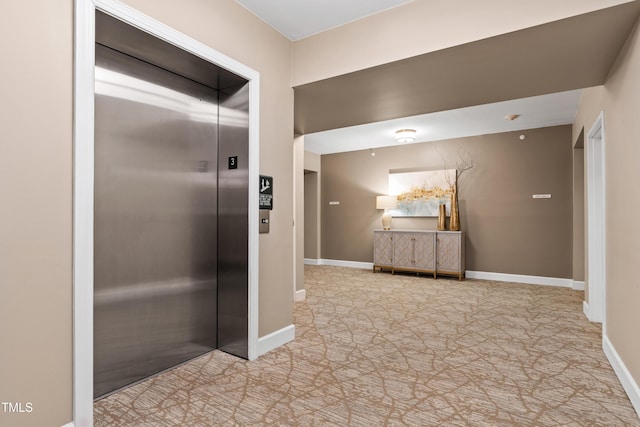 116 Northbrook Dr Unit 303, Raleigh, NC 27609 - hallway with elevator and carpet floors