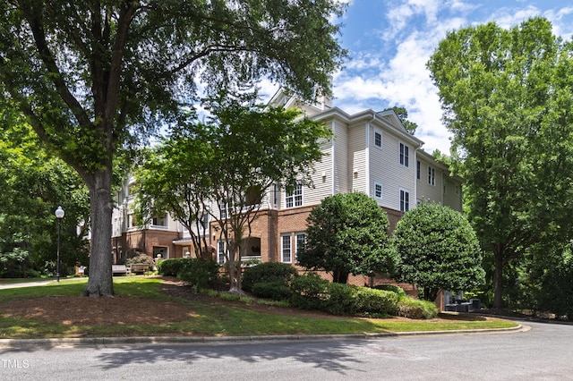 116 Northbrook Dr Unit 303, Raleigh, NC 27609 - view of front of home with brick siding