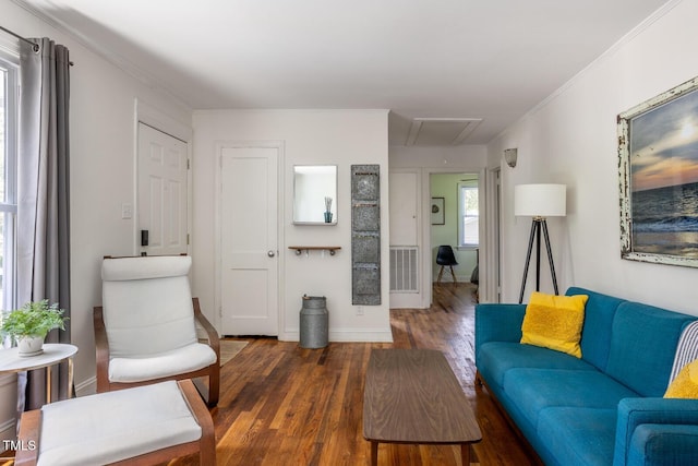 2331 Stevens Rd, Raleigh, NC 27610 - living area with attic access, wood finished floors, and crown molding
