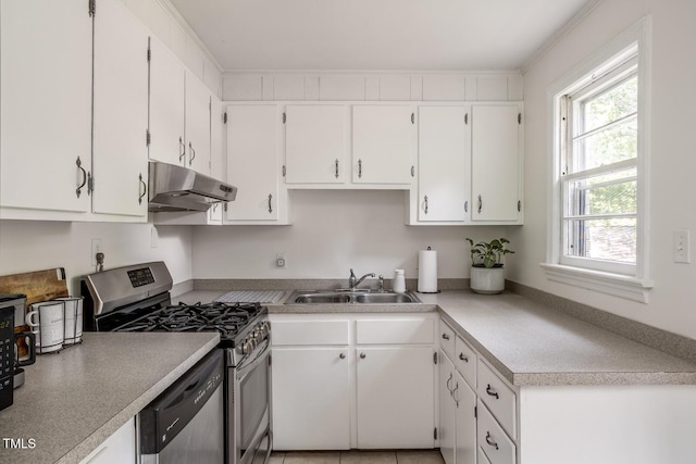 2331 Stevens Rd, Raleigh, NC 27610 - kitchen featuring under cabinet range hood, appliances with stainless steel finishes, white cabinets, and light countertops