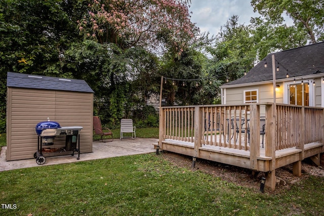 2331 Stevens Rd, Raleigh, NC 27610 - view of grassy yard featuring a patio area, a deck, and a storage shed