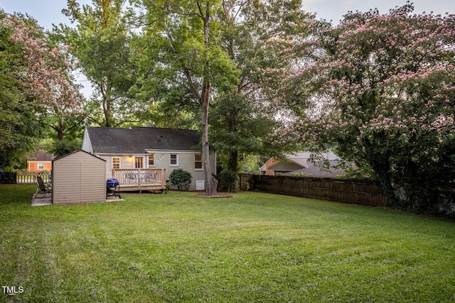 2331 Stevens Rd, Raleigh, NC 27610 - back of house with a deck, a fenced backyard, and a shed