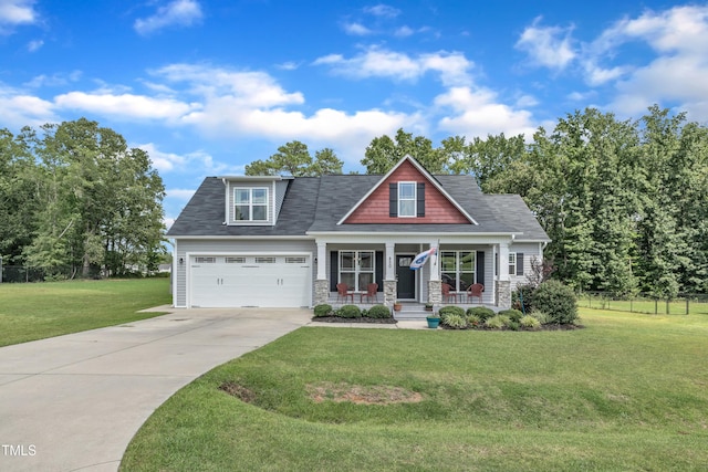 450 Cotton Mill Dr, Zebulon, NC 27597 - craftsman inspired home featuring a porch, driveway, and stone siding