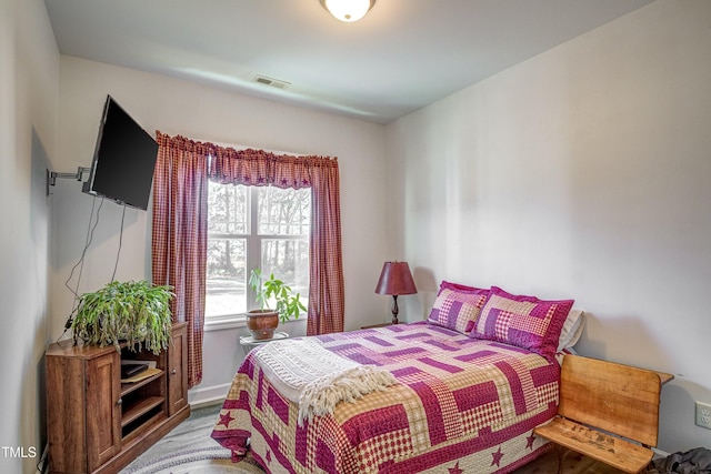 450 Cotton Mill Dr, Zebulon, NC 27597 - bedroom featuring wood finished floors