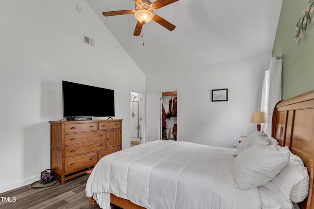 450 Cotton Mill Dr, Zebulon, NC 27597 - bedroom with wood finished floors, high vaulted ceiling, a spacious closet, ceiling fan, and connected bathroom