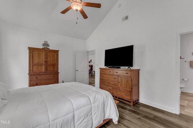 450 Cotton Mill Dr, Zebulon, NC 27597 - bedroom featuring high vaulted ceiling, ensuite bathroom, wood finished floors, and ceiling fan