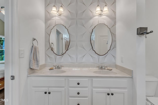 450 Cotton Mill Dr, Zebulon, NC 27597 - bathroom featuring double vanity and toilet