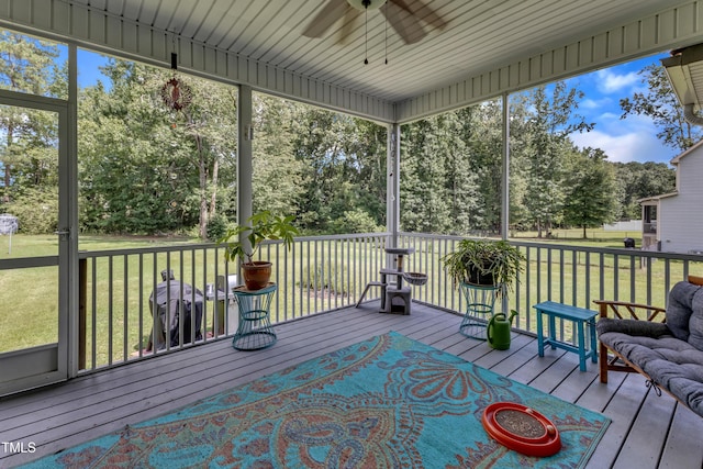 450 Cotton Mill Dr, Zebulon, NC 27597 - unfurnished sunroom with a ceiling fan and view of wooded area