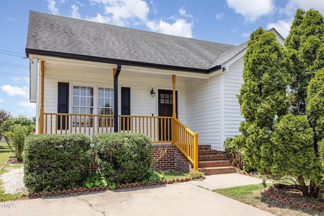 637 Convexa Ct, Wendell, NC 27591 - view of front facade with roof with shingles and a porch