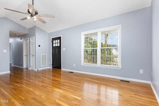 637 Convexa Ct, Wendell, NC 27591 - unfurnished living room with a ceiling fan, light wood-type flooring, and vaulted ceiling
