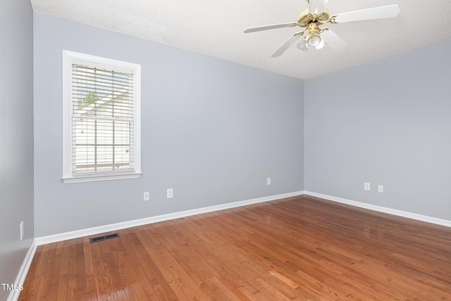 637 Convexa Ct, Wendell, NC 27591 - unfurnished room featuring wood finished floors and a ceiling fan