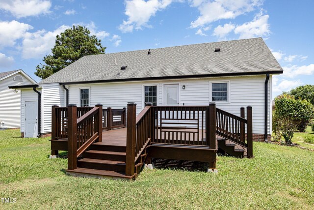 637 Convexa Ct, Wendell, NC 27591 - back of house featuring a wooden deck, a shingled roof, and a yard