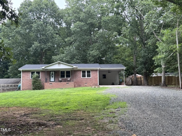 6740 Guess Rd, Hillsborough, NC 27278 - single story home with driveway, an attached carport, brick siding, and a ceiling fan