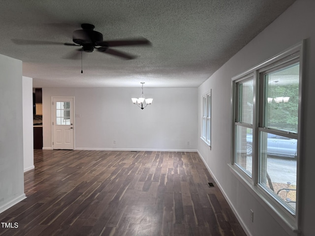 6740 Guess Rd, Hillsborough, NC 27278 - unfurnished living room featuring a chandelier, dark wood-style flooring, ceiling fan, and a textured ceiling