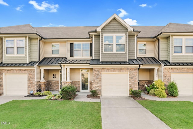 7817 Elmshire Way, Raleigh, NC 27616 - view of property with a standing seam roof, an attached garage, concrete driveway, a front yard, and roof with shingles