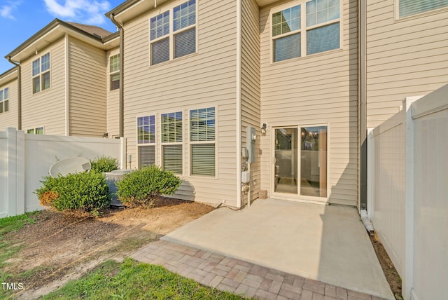 7817 Elmshire Way, Raleigh, NC 27616 - rear view of property with a patio area