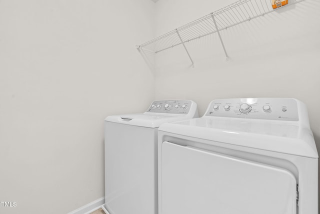 7817 Elmshire Way, Raleigh, NC 27616 - laundry room with separate washer and dryer and baseboards