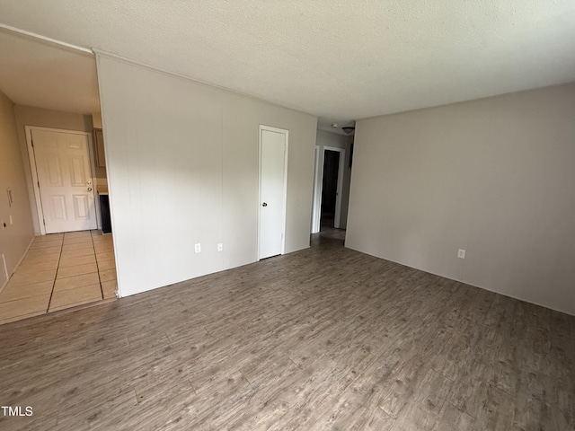 306 N Discovery St Unit A, B, C, D, Rocky Mount, NC 27801 - spare room with wood finished floors and a textured ceiling