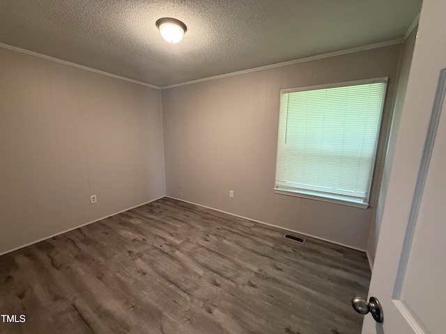 306 N Discovery St Unit A, B, C, D, Rocky Mount, NC 27801 - unfurnished room featuring wood finished floors, ornamental molding, and a textured ceiling