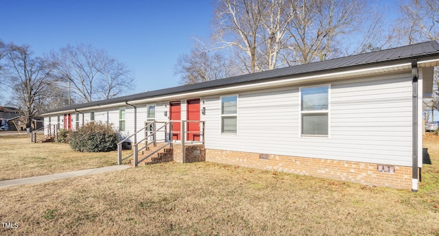 306 N Discovery St Unit A, B, C, D, Rocky Mount, NC 27801 - view of front facade featuring crawl space, a front lawn, and a metal roof