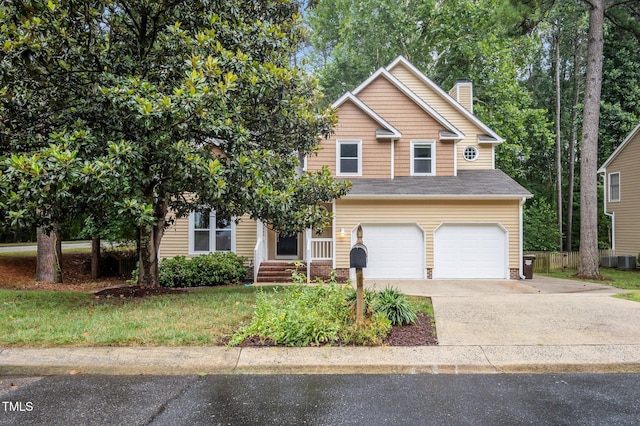 3 Fieldcrest Ct, Durham, NC 27713 - traditional home with a chimney, an attached garage, and concrete driveway