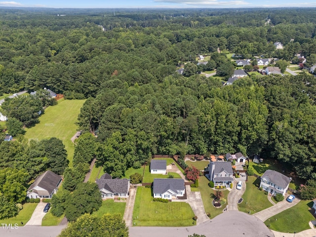 4812 Morecambe Way, Apex, NC 27539 - aerial view of property's location featuring a heavily wooded area and nearby suburban area