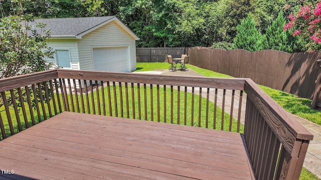 4812 Morecambe Way, Apex, NC 27539 - wooden deck with a fenced backyard, a detached garage, an outbuilding, and outdoor dining area
