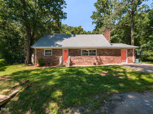 1831 Washington Dr, Hillsborough, NC 27278 - single story home featuring entry steps, a front lawn, crawl space, a chimney, and brick siding