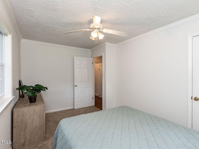 1831 Washington Dr, Hillsborough, NC 27278 - bedroom with carpet flooring, ceiling fan, a textured ceiling, and crown molding