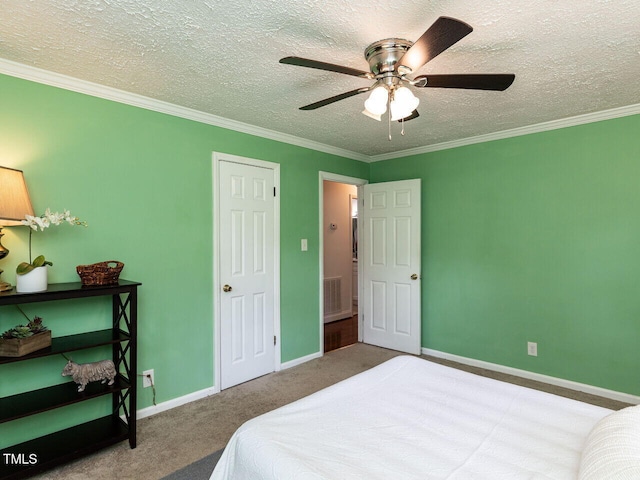 1831 Washington Dr, Hillsborough, NC 27278 - bedroom with a textured ceiling, carpet floors, ornamental molding, and a ceiling fan