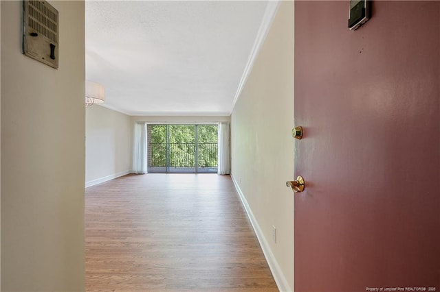 1100 Clarendon St Unit 303, Fayetteville, NC 28305 - empty room featuring ornamental molding and wood finished floors