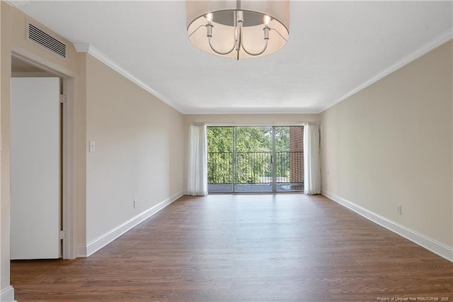 1100 Clarendon St Unit 303, Fayetteville, NC 28305 - spare room with wood finished floors, a chandelier, and crown molding