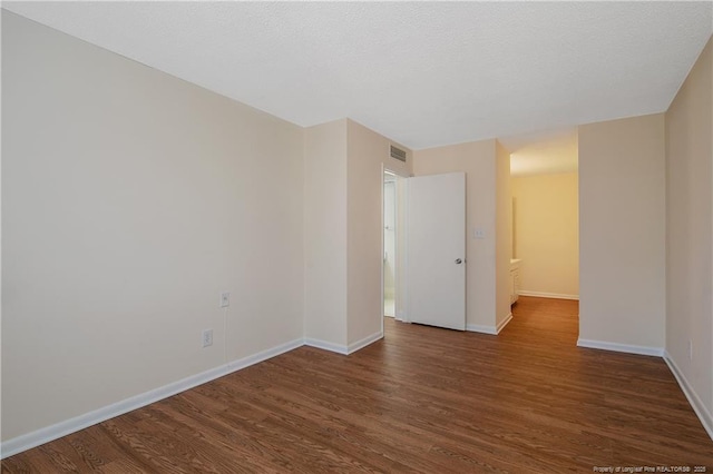 1100 Clarendon St Unit 303, Fayetteville, NC 28305 - empty room featuring dark wood finished floors