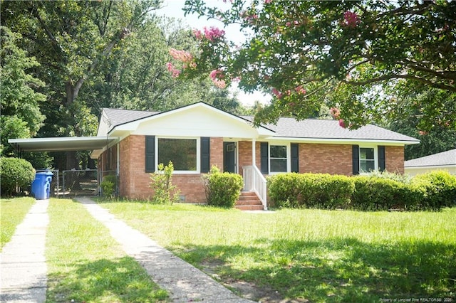 5404 S Sumac Cir, Fayetteville, NC 28304 - ranch-style house featuring driveway, brick siding, and a carport