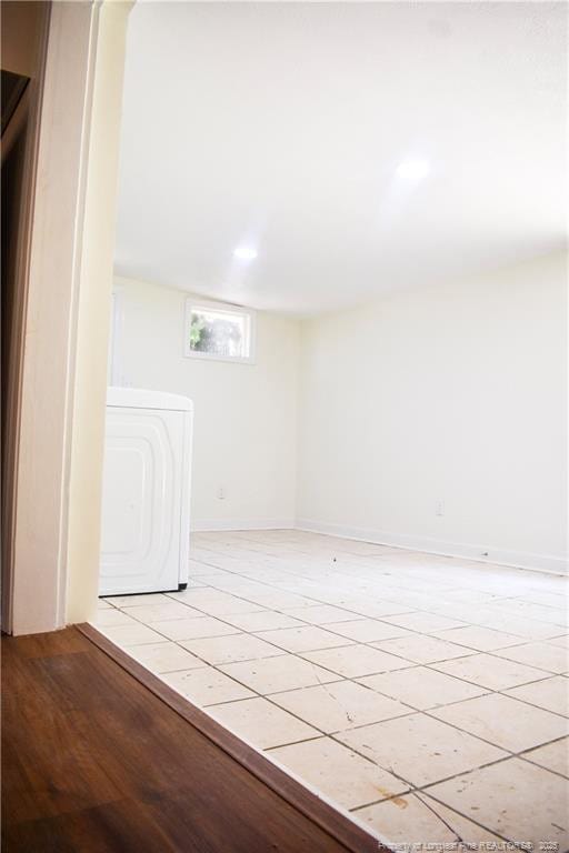 5404 S Sumac Cir, Fayetteville, NC 28304 - unfurnished room featuring washer / dryer and light tile patterned flooring