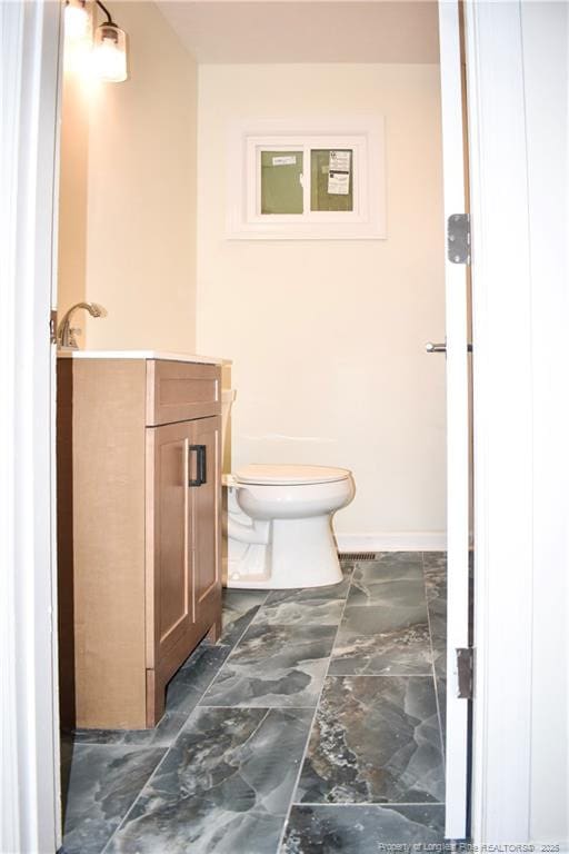 5404 S Sumac Cir, Fayetteville, NC 28304 - half bath featuring marble finish flooring and vanity
