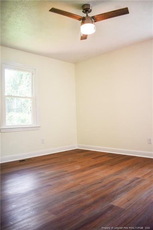 5404 S Sumac Cir, Fayetteville, NC 28304 - spare room featuring dark wood finished floors and a ceiling fan