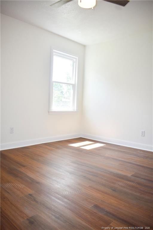5404 S Sumac Cir, Fayetteville, NC 28304 - empty room with dark wood-type flooring and a ceiling fan