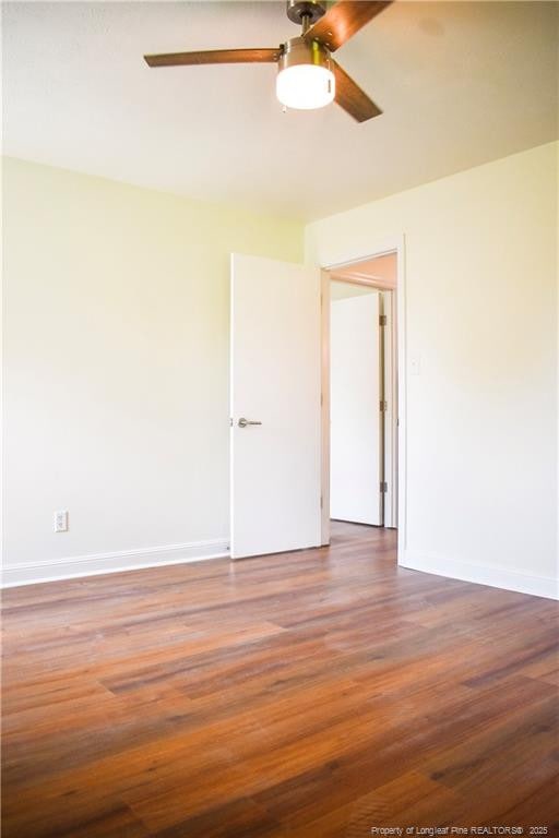 5404 S Sumac Cir, Fayetteville, NC 28304 - empty room with a ceiling fan and wood finished floors